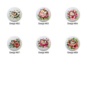 May include: A collection of eleven white ceramic cabinet knobs, each featuring a different floral design with a sleeping mouse. The knobs are round and have a glossy finish. Each knob is labeled with a design number.