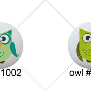 May include: Four ceramic owl buttons with different colors and designs. The owls are red, green, green, and purple. The buttons are labeled owl #1001, owl #1002, owl #1003, and owl #1004.
