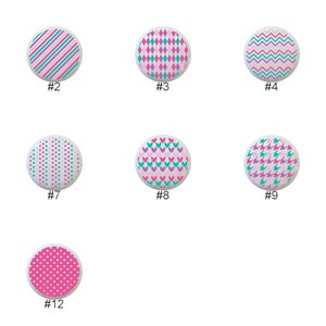 May include: Twelve different patterned circles with pink, teal, and purple colors. The circles are numbered 1 through 12.