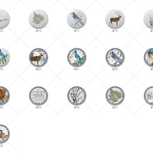 May include: A collection of 29 round ceramic ornaments with various winter-themed designs. The ornaments feature images of birds, deer, snowflakes, and the word "Winter".