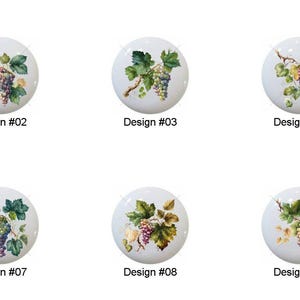 May include: A collection of ten white ceramic cabinet knobs, each featuring a unique watercolor design of grapes and leaves. Each knob is labeled with a design number from #01 to #10.