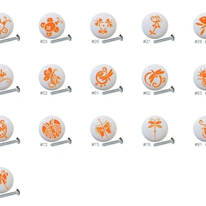 May include: Assortment of 12 white ceramic drawer knobs with orange insect and butterfly designs. Each knob has a screw for installation.