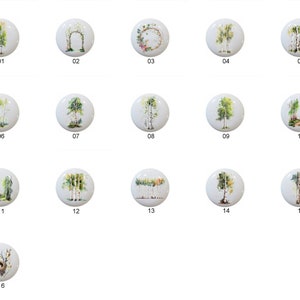 May include: Set of 16 ceramic tiles featuring watercolor illustrations of birch trees, a bird's nest, and a floral wreath. The tiles are white with a glossy finish.