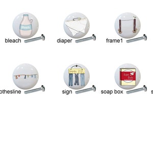 May include: Set of 10 white ceramic knobs with various laundry-themed illustrations. The knobs feature images of a laundry basket, clothesline, bleach bottle, diaper, sign, soap box, sunflower, and more. Each knob has a silver screw.
