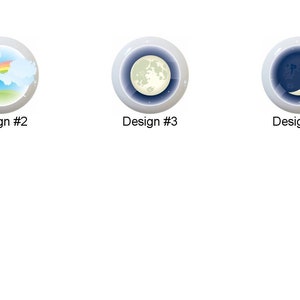 May include: Six different designs for a round, white ceramic button with a colorful image in the center. The designs include a yellow lightning bolt in a blue sky, a rainbow over a green hill, a full moon in a blue sky, a crescent moon in a dark blue sky, a yellow sun rising over a green hill, and a yellow sun with palm trees in a blue sky.