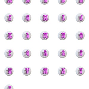May include: A set of 26 alphabet letter ceramic knobs with a pink and white color scheme. Each knob features a cartoon mouse holding a letter. The letters are in a pink bubble font.