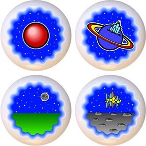 May include: Eight ceramic knobs with a space theme. Each knob features a different space-themed design, including planets, stars, and a spaceship. The knobs are white with a blue background and white stars.