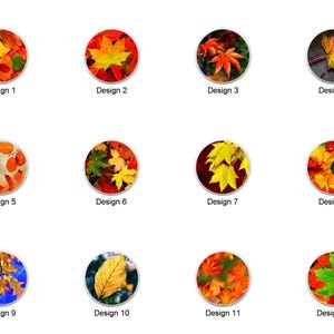 May include: Twelve circular designs featuring colorful autumn leaves. Each design showcases a unique arrangement of leaves in shades of red, orange, yellow, and green. The designs are labeled "Design 1" through "Design 12".