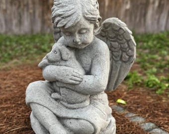 Sitting cherub figure Concrete boy holding puppy Garden statuary Cement angel with dog statue Outdoor sculpture Yard stone angel memorial