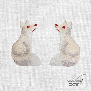 Könnte beinhalten: Ein Set aus drei Keramikbechern mit gesprenkelter, matter Oberfläche. Die Becher sind in Creme-, Hellbraun- und Dunkelbrauntönen gehalten. Jeder Becher hat ein schlichtes, minimalistisches Design.