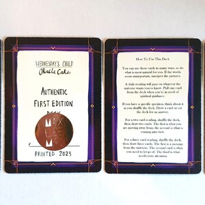 May include: Close-up of two cards from a deck of Wednesday's Child Oracle Cards. The card on the left shows the text "Wednesday's Child Oracle Cards", "Authentic First Edition Deck", and "Printed 2023". The card on the right shows instructions on how to use the deck.
