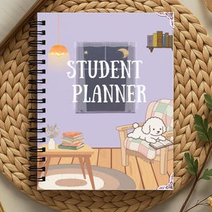 May include: A spiral-bound student planner with a light purple cover featuring an illustration of a cozy room at night. The text "STUDENT PLANNER" is centered above a window, a wooden table with books, and a chair with a white dog reading a book.