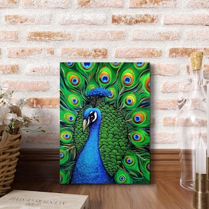 May include: A vibrant peacock painting on canvas. The artwork features a blue peacock with a detailed green and blue tail. The background is a textured brick wall, with a wooden surface in the foreground.