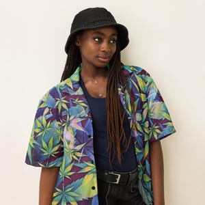 May include: A set of three ceramic mugs with a speckled, matte finish. The mugs are in shades of cream, light gray, and dark gray. Each mug has a simple, minimalist design, perfect for coffee or tea.