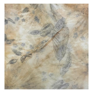 May include: A beige fabric with a light brown and gray leaf pattern. The fabric has a soft, flowing texture.