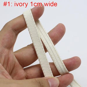 6 Meter 1 cm 0,39 "breite schwarz / elfenbein / apricot / braun zweiseitige Linie PU-Leder DIY Tasche Hut Armband Halskette Zubehör Material V7K9C250325T