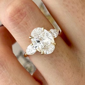3.5 Carat Oval EF VVS Lab Grown Diamond Three Stone Ring / 3 Stone Engagement Ring / Oval and pear Diamond Trilogy Ring in 14k Yellow Gold