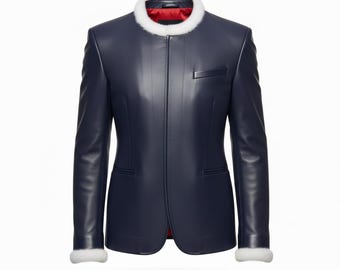May include: A navy blue leather jacket with a mandarin collar and a white fur trim. The jacket has a small chest pocket and white fur cuffs. The interior lining is red. The jacket is a tailored fit.