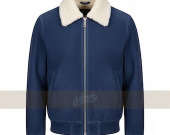 May include: A navy blue jacket with a cream-coloured, fluffy collar. The jacket features a zip closure and a ribbed hem and cuffs. The jacket is a bomber style.