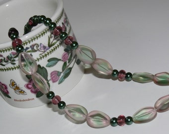 Emerald Green Pearl Necklace with Pink-Green Glass Shaped Leaves with Plum Glass Round Beads with Sterling Silver Ribbed Toggle Closure