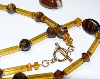 Golden Delight.. Glass Amber Color Tubular Beads with Tiger Eye and Swarovski Beaded Long Handmade Ladies Necklace; Gold Necklace