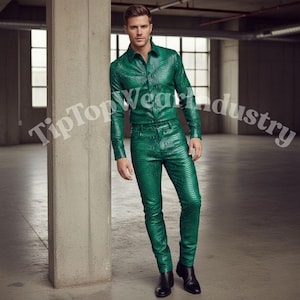 May include: A green snakeskin-patterned shirt and pants set. The long-sleeved button-down shirt and fitted pants are a vibrant green color. The outfit is paired with black shoes. The text "TipTopWear industry" is visible in the image.