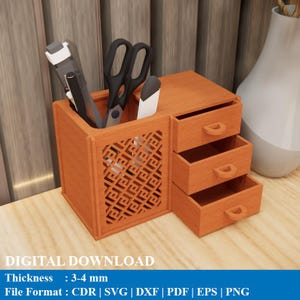 May include: A wooden desk organizer with three small drawers and a compartment for pens and scissors. The organizer has a decorative lattice design on the front. The text "DIGITAL DOWNLOAD" is visible.