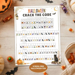 May include: A white paper activity sheet titled Halloween Crack The Code featuring a letter-to-icon cipher key and five rows of icon-based secret messages to decode. The page is decorated with illustrations of pumpkins, a black cat, and lanterns.