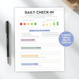 May include: A white daily check-in paper sheet with black text, featuring sections for mood, energy, self-care, gratitude, challenges, pride, and reflections. A blue circular badge reads 5-MINUTE MENTAL HEALTH CHECK-IN. A black pen lies to the left.
