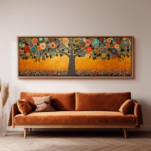 May include: A framed artwork showing a stylized tree with colourful, circular blossoms. The tree's trunk is textured, and the background is a warm yellow. The artwork is displayed above a rust-coloured sofa.