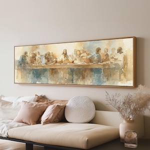 May include: A horizontal rectangular wall art print featuring a watercolor-style depiction of the Last Supper. The artwork uses a muted palette of soft browns, tans, and pale blues to illustrate a central figure seated at a long table with others.