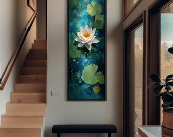 Puede incluir: Impresión vertical en lienzo enmarcado que presenta un nenúfar blanco con centro amarillo, flotando sobre un estanque turquesa. Hojas de nenúfar verdes rodean la flor. La obra se exhibe en una pared blanca.