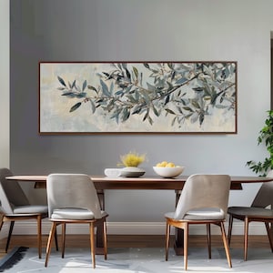 May include: A horizontal rectangular wall art piece featuring an oil painting of olive branches with dark green and grey leaves against a soft, pale cream and light blue background, enclosed in a thin, dark brown wooden frame.