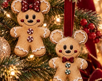 May include: Two gingerbread-style bear ornaments hanging from dark red velvet ribbons. One bear features a red polka-dot bow, while the other wears a red bow tie. Both have white icing details, peppermint-style buttons, and round rosy cheeks.