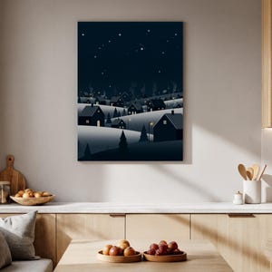 May include: A canvas print depicting a winter village scene under a starry night sky. The artwork features stylized houses with lit windows, set against snowy hills and dark blue sky. The overall color palette is cool, with shades of blue and gray.