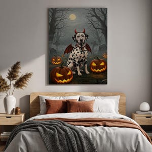 May include: A Halloween-themed canvas print featuring a Dalmatian dog dressed as a devil, complete with horns and wings. The dog is surrounded by carved jack-o'-lanterns in a spooky graveyard setting under a full moon. The artwork evokes a festive, seasonal atmosphere.