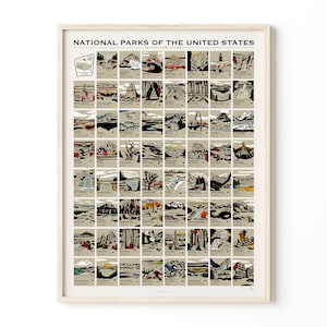 May include: Framed print titled "National Parks of the United States." The artwork features a grid of illustrated park scenes, each labeled with park names. The color palette includes beige, brown, and touches of red and blue. The print is encased in a light-colored wooden frame.