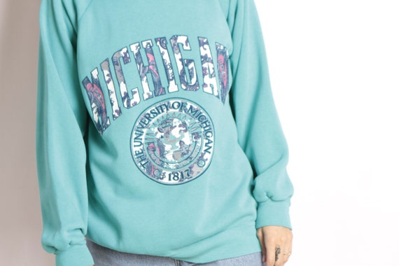 90s University of Michigan football teal blue pullover vintage 1990s sweatshirt pullover blue raglan top 814666 90s University of Michigan football teal blue pullover vintage 1990s sweatshirt pullover blue raglan top 814666