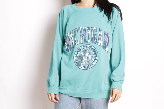 90s University of Michigan football teal blue pullover vintage 1990s sweatshirt pullover blue raglan top 814666 90s University of Michigan football teal blue pullover vintage 1990s sweatshirt pullover blue raglan top 814666