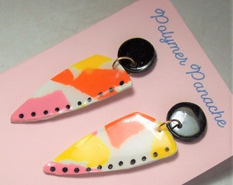 Colorful dagger dangle earrings red yellow lavender on white background black accents party earrings summer, spring earrings