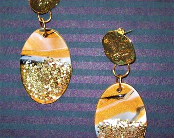 Earrings Polymer clay gold, white & black oval dangle earrings lots of gold glitter and a hammered gold plate top bead very light weight