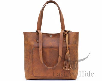 Bolsa de ombro artesanal em couro Crazy Horse para mulheres.