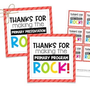 Può includere: Etichette di ringraziamento stampabili a strisce rosse e bianche con il testo "Grazie per aver reso la presentazione primaria un successo!" e "Grazie per aver reso il programma primario un successo!" in lettere nere e colorate.