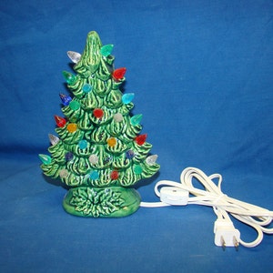9” tall Handmade ceramic Christmas tree.  GREEN color,twist lights