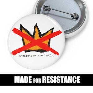 No Kings UN escalator Pin makes fun of Trump – "Escalators Are Hard" Protest Button