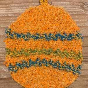 Brightly Painted Egg Pot Holder handmade crocheted egg shaped trivet