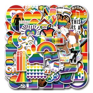 May include: A collection of colorful stickers with rainbow and LGBTQ+ pride themes. The stickers feature various designs, including hearts, rainbows, flags, and text such as "Love is Love" and "World Pride".