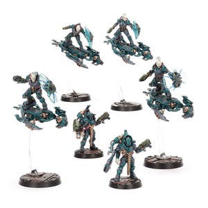 May include: Miniature figurines of futuristic soldiers in teal and gray armor. Some figures are mounted on teal hovercrafts, while others stand on circular bases. The figures are posed with weapons and energy shields, suggesting a science fiction theme.