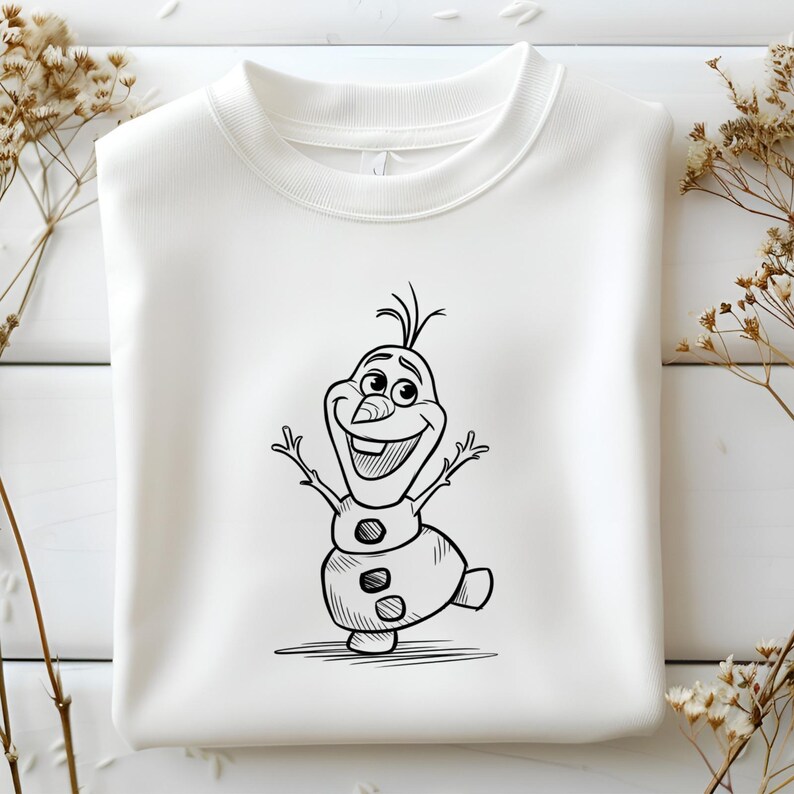 May include: White crew neck sweatshirt featuring a black and white cartoon illustration of Olaf, the snowman character. Olaf is smiling with his arms raised, and the design is centered on the front of the sweatshirt.