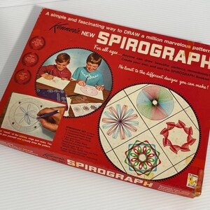 May include: Vintage Spirograph drawing toy box. The red box features the text "Kenner's NEW SPIROGRAPH" and illustrations of children using the toy. The box also shows examples of the patterns that can be created.
